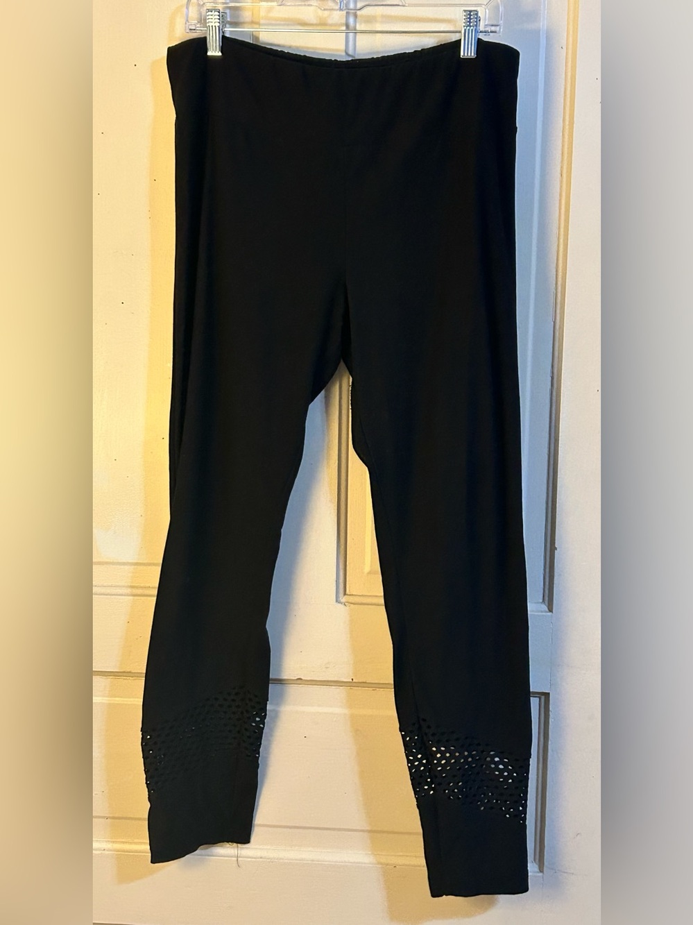 No Boundaries Black Capri Leggings with Laser-Cut Detail
